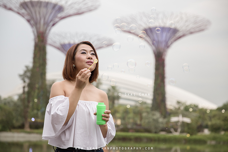 lifestyle photography at dragonfly lake, looking at silver garden, gardens by the bay