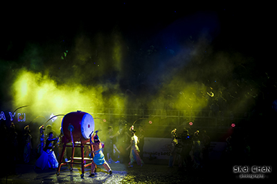 participants beating the drum